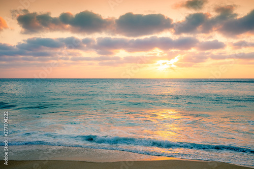 Sunset over the sea. Atlantic ocean in evening, sandy beach © vvvita