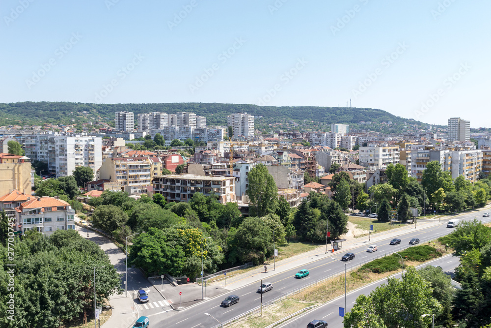 Aerial view of urban area. Residential buildings, street, cars in Eastern Europe.