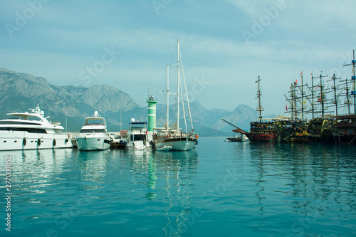 Yachts and ships in the port of Kemer  Sunny day beautiful sea  Antalya  Turkey.