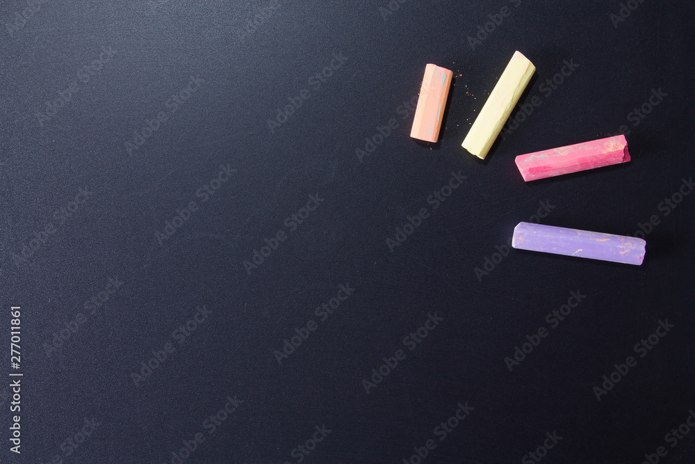colored pencils and blackboard, back to school concept colored pencils and blackboard, back to school concept