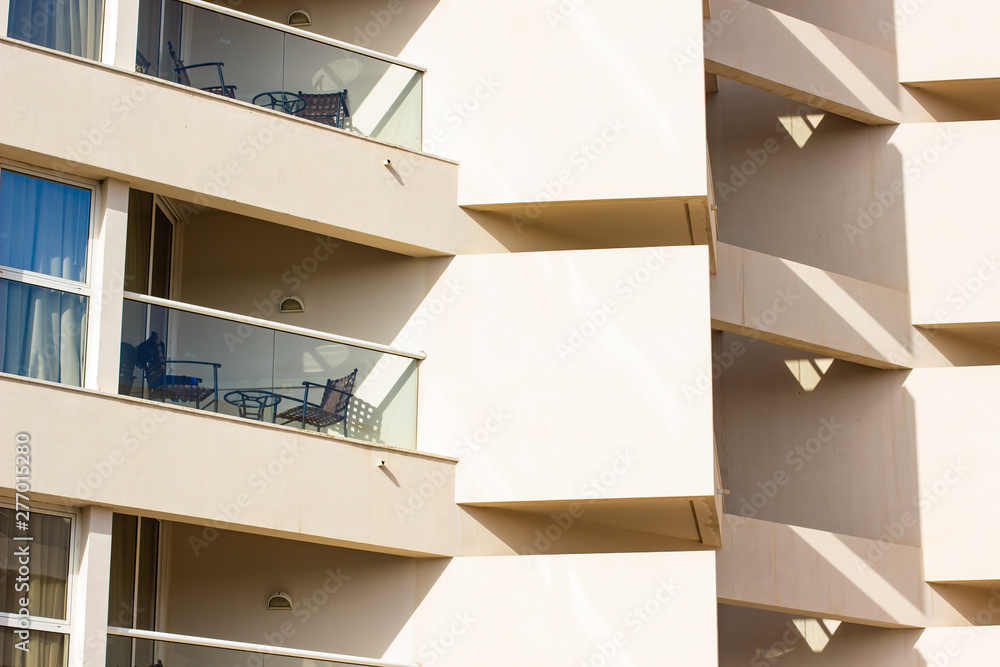 Fototapeta premium modern common living building facade exterior architecture background with white wall balcony and window 