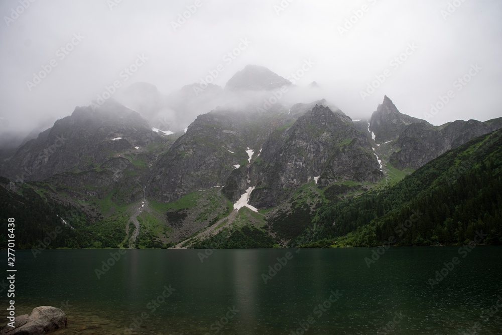 View on Tatra mountains from Morskie Oko, Poland, heavy fog