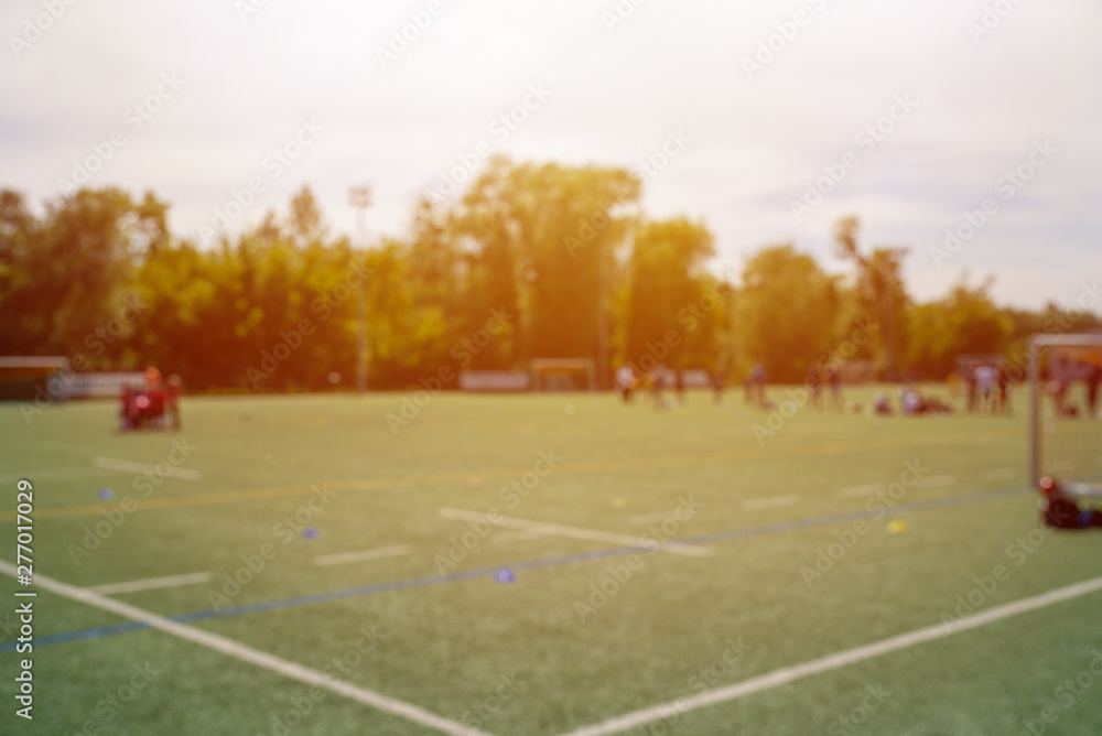 Fototapeta premium training of young footballers defocused