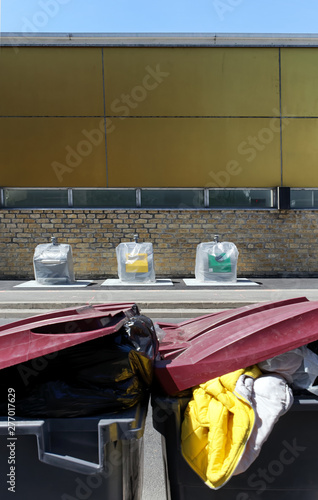 selective sorting and old  waste container in Paris suburb photo