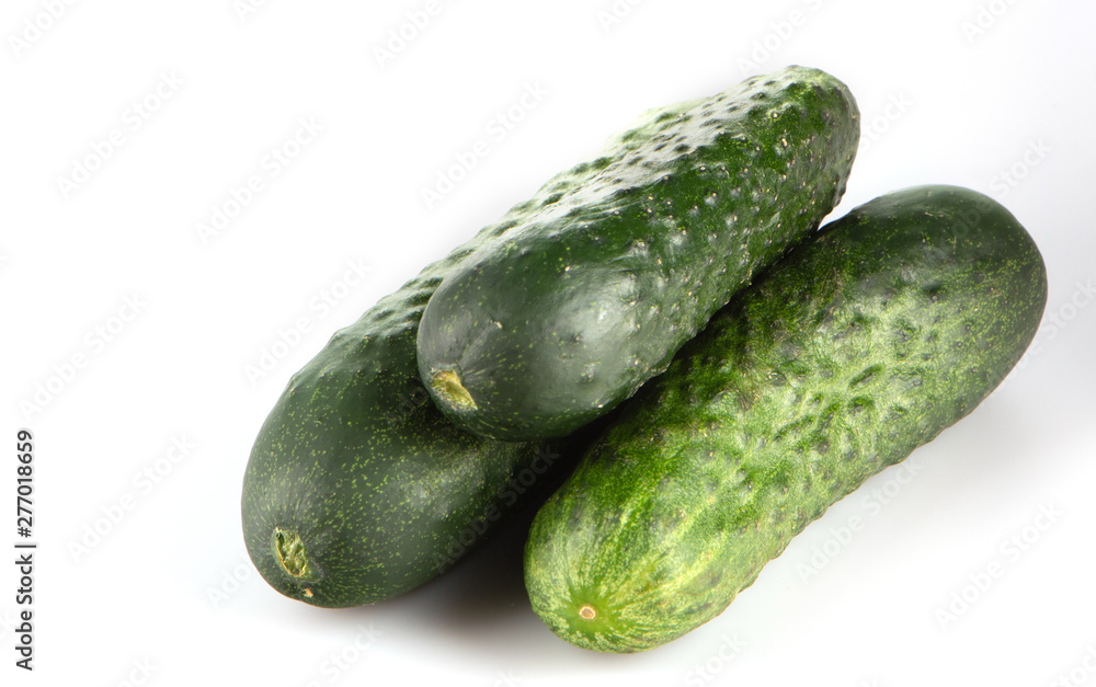 three green cucumber on a white background three green cucumber on a white background