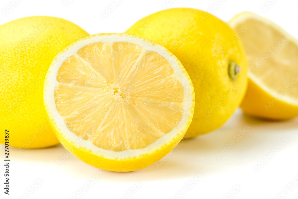Juicy lemons on a completely white background. Fruits and vitamins. Juicy lemons on a completely white background. Fruits and vitamins.