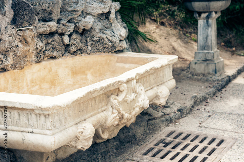 Fragment of fountaine in Giardino Bellini, Catania, Sicily, Italy,