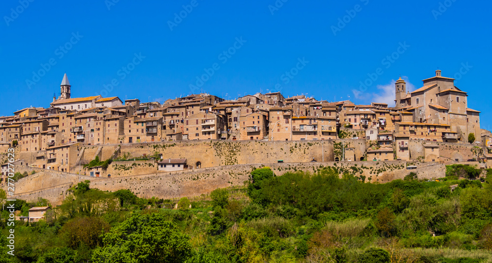 Panoramic view of Grotte di Castro skyline, mediaeval town near lake Bolsena, Viterbo province, central Italy Panoramic view of Grotte di Castro skyline, mediaeval town near lake Bolsena, Viterbo province, central Italy