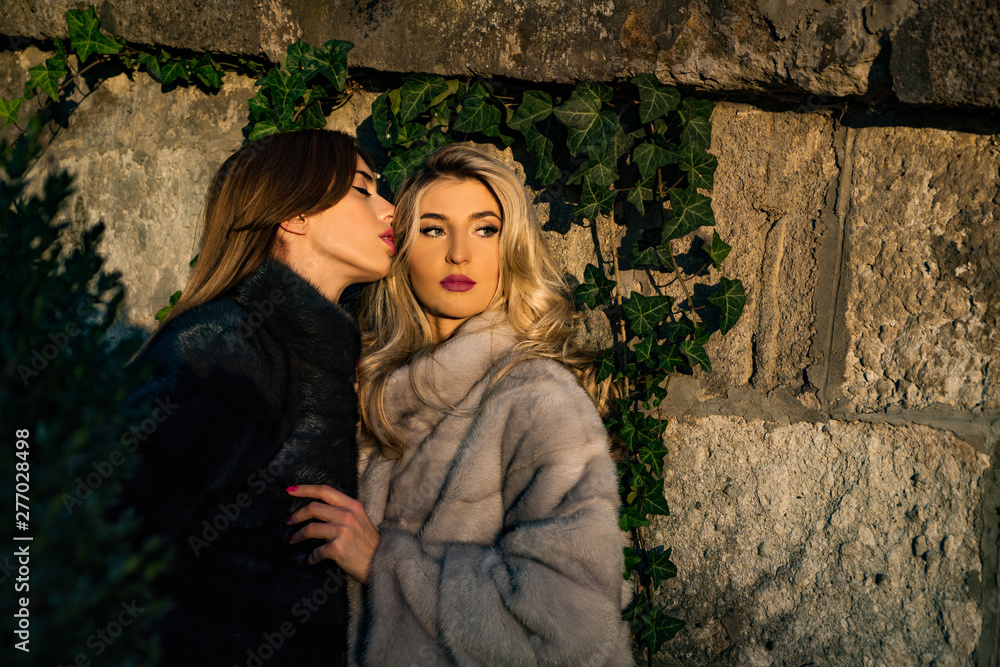 Attraction and magnetism. Fashion outfit. Fashion women fur coats. Dreamy and mysterious. Sensual girls fur clothes cuddling nature background. Girls fashion models wear furry clothes. Warm clothes