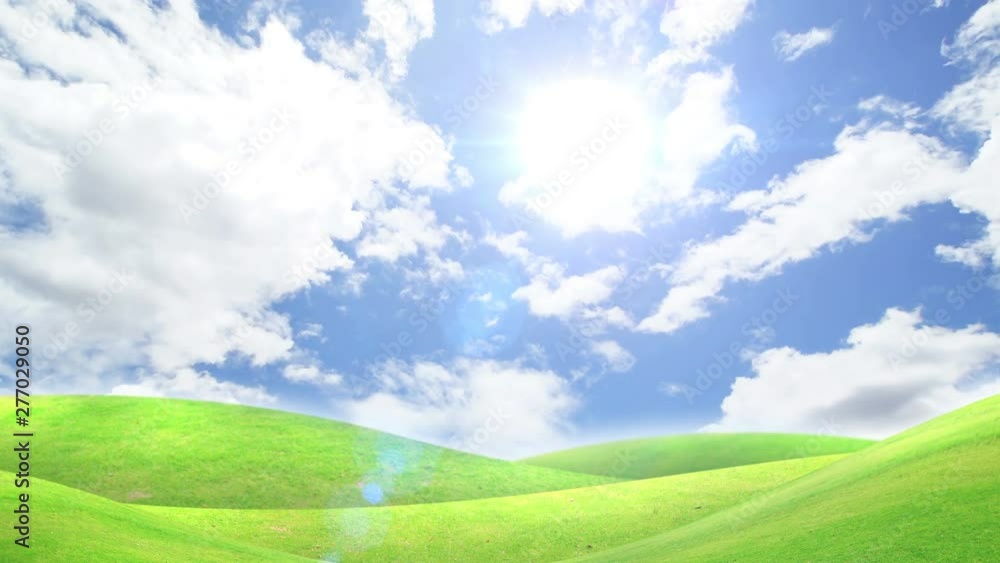 Green field with time lapse of clouds background. Green field with time lapse of clouds background.
