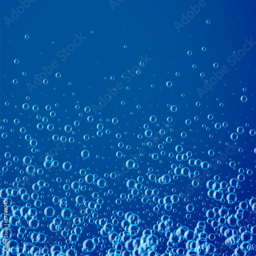 blue background with many water or soap bubbles