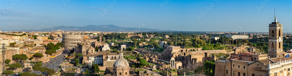 Panoramic  sunset view of  Colosseum and Roman Forum  in Rome.