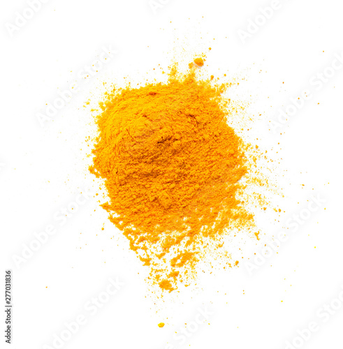 Turmeric (Curcuma) powder pile isolated on white background, top view