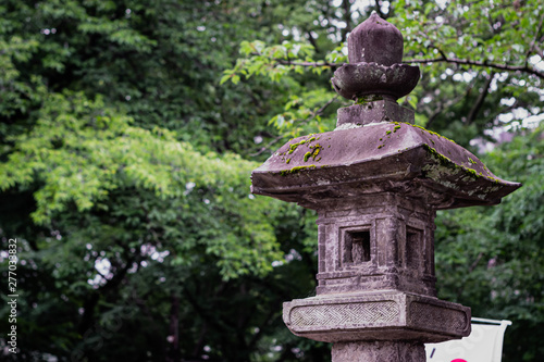 It is a lantern of a Japanese shrine.