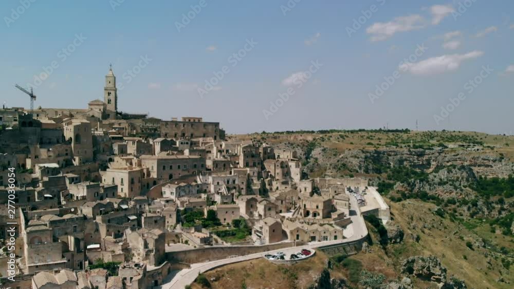Aerial view of ancient town of Matera Sassi di Matera in sunny day, Basilicata, southern Italy Aerial view of ancient town of Matera Sassi di Matera in sunny day, Basilicata, southern Italy