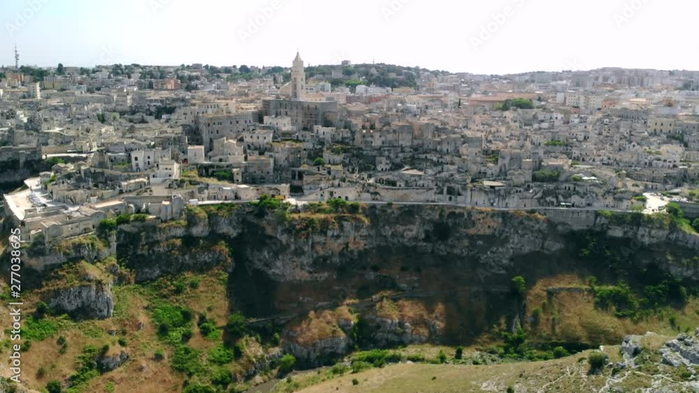 Aerial view of ancient town of Matera circling around city, Italy Aerial view of ancient town of Matera circling around city, Italy