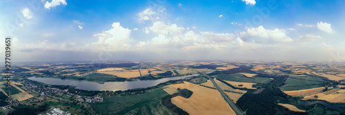 Panoramic view of the lake and surrounding agriculrural fields. 