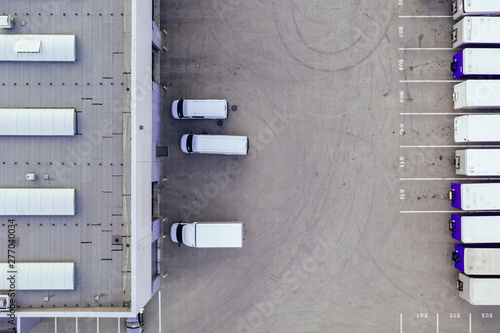 Aerial view of the distribution center, drone photography of the industrial logistic zone. 