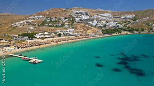 Aerial drone photo of famous organised beach of Elia with emerald clear sandy sea shore, Mykonos island, Cyclades, Greece 