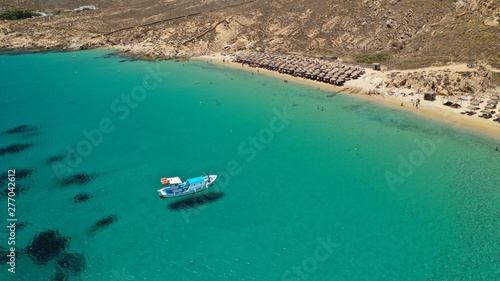 Aerial drone photo of famous organised beach of Elia with emerald clear sandy sea shore, Mykonos island, Cyclades, Greece 