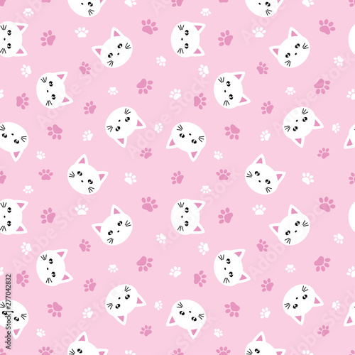 Seamless pattern cute cat faces and paws on pink background