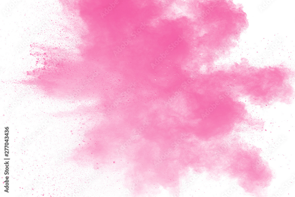 Abstract pink powder explosion on white background. Freeze motion of pink dust splattered.