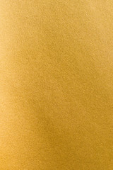 Gold foil leaf shiny wrapping paper texture background for wall paper decoration element