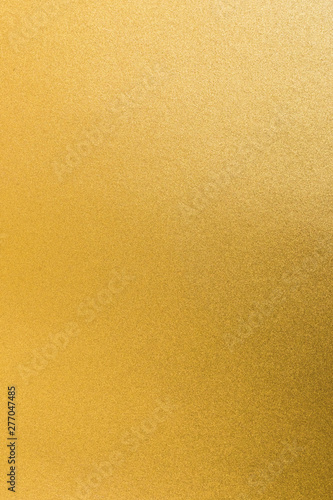Fotografie Gold foil leaf shiny wrapping paper texture background for wall paper decoration