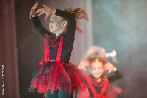 A little girl performs a dance number.Little girl dancing