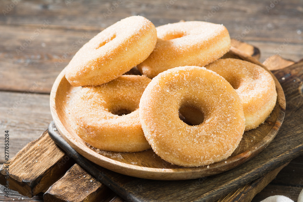 Doughnuts with sugar sprinkles. Rustic style