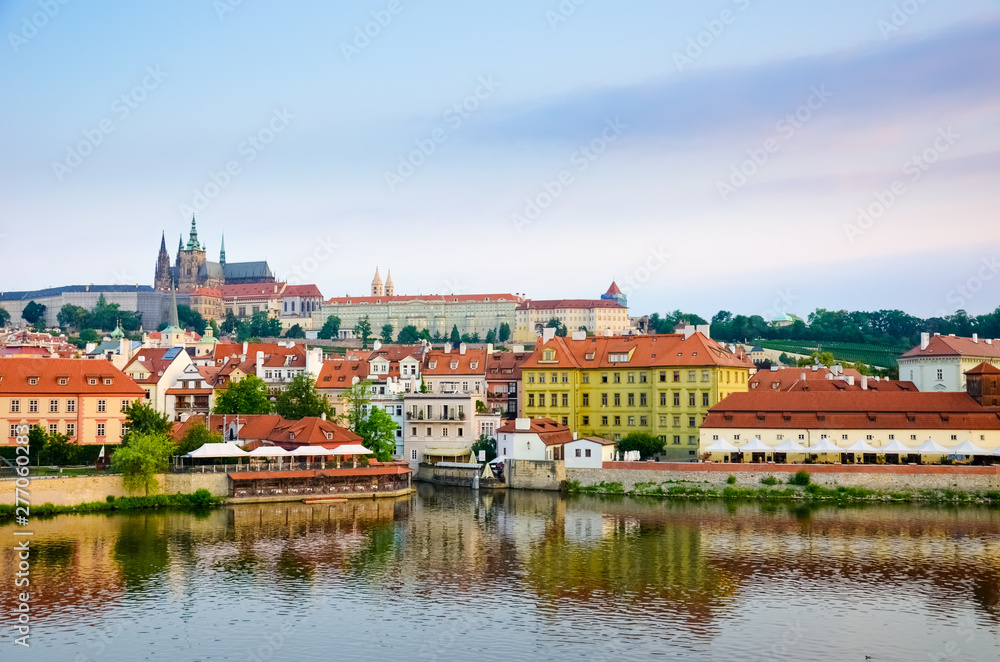 Amazing view of Prague Castle and historical old town taken with Vltava river. Sunrise light. Capital of Czech Republic. Beautiful skylines. Cityscape. Amazing cities. Bohemia, travel spot
