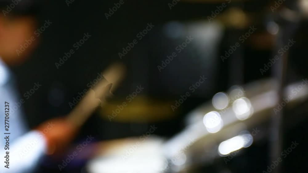 Young drummer playing at drums set, Human hands playing the drum kit in music room, musical instruments and entertainment concept Young drummer playing at drums set, Human hands playing the drum kit in music room, musical instruments and entertainment concept