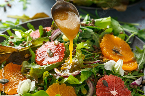 Φωτογραφία Orange and grapefruit Citrus salad with lentills vertes, wild rocket, arugula, r