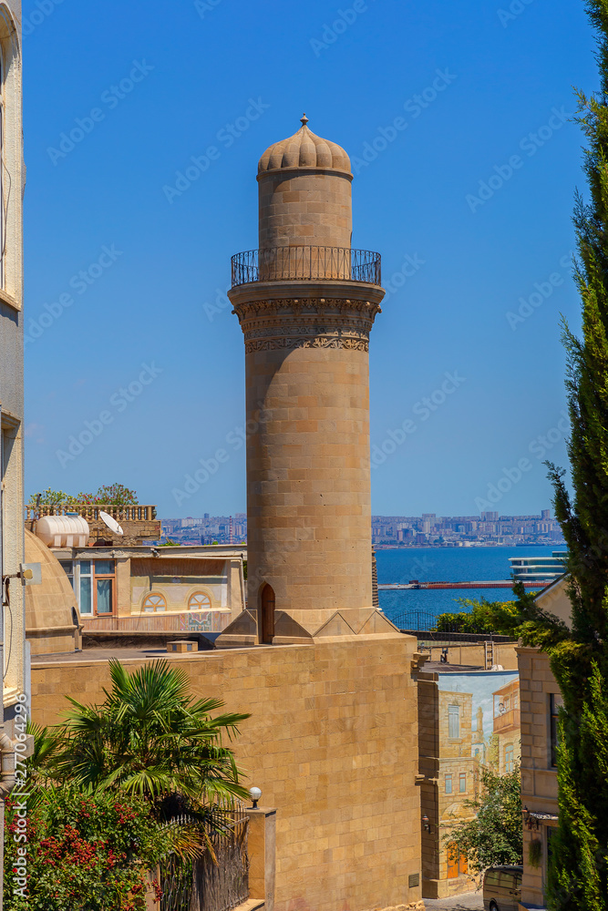 Minaret of a mosque in the old city-fortress in Baku