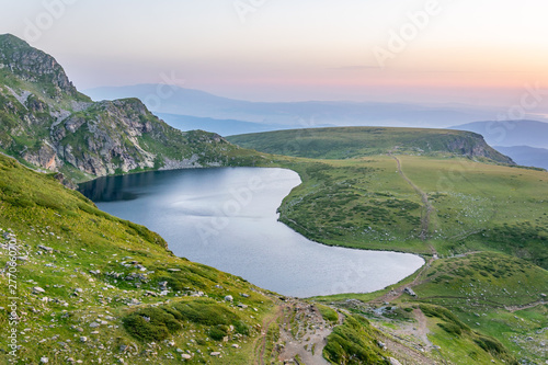 Sunrise view of the Kidney lake, one of the seven rila lakes in Bulgaria photo