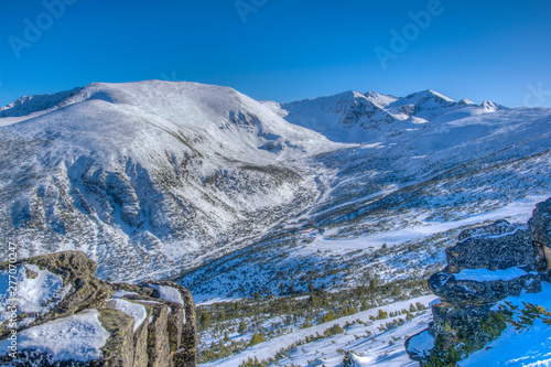 Musala mountain, the highest peak of Bulgaria, and surrounding mountains in Bulgaria during winter photo