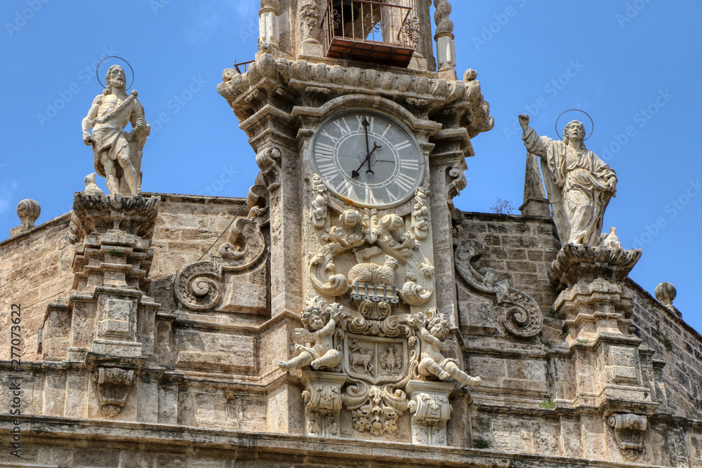 Details of the facade of the church of Santos Juanes in front of the Lonja de la Seda, and next to the Central Market in Valencia, Spagna