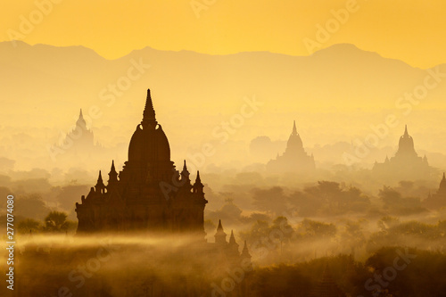 Sunrise landscape view with silhouettes of old temples  Bagan  Myanmar  Burma 