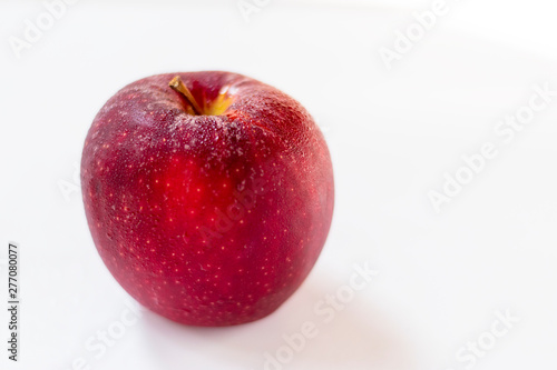 Fresh red apple isolated on white © Daniel Ferryanto
