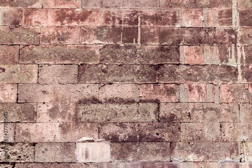 The old brick wall background or brick wall texture  or retro grunge wallpaper with the copy space