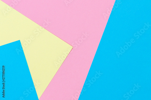Abstract geometric shape pastel pink, yellow and light blue color paper background
