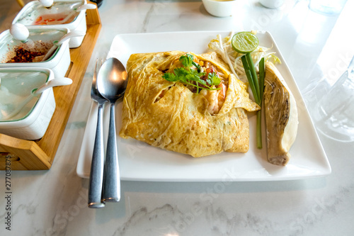 pad Thai (Fried Thai Noodle with Shrimp Wrapped in Egg) Thailand's renowned food.