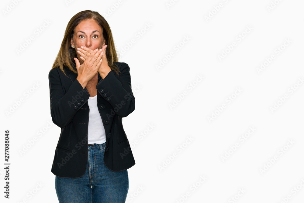 Beautiful middle age business adult woman over isolated background shocked covering mouth with hands for mistake. Secret concept. Beautiful middle age business adult woman over isolated background shocked covering mouth with hands for mistake. Secret concept.