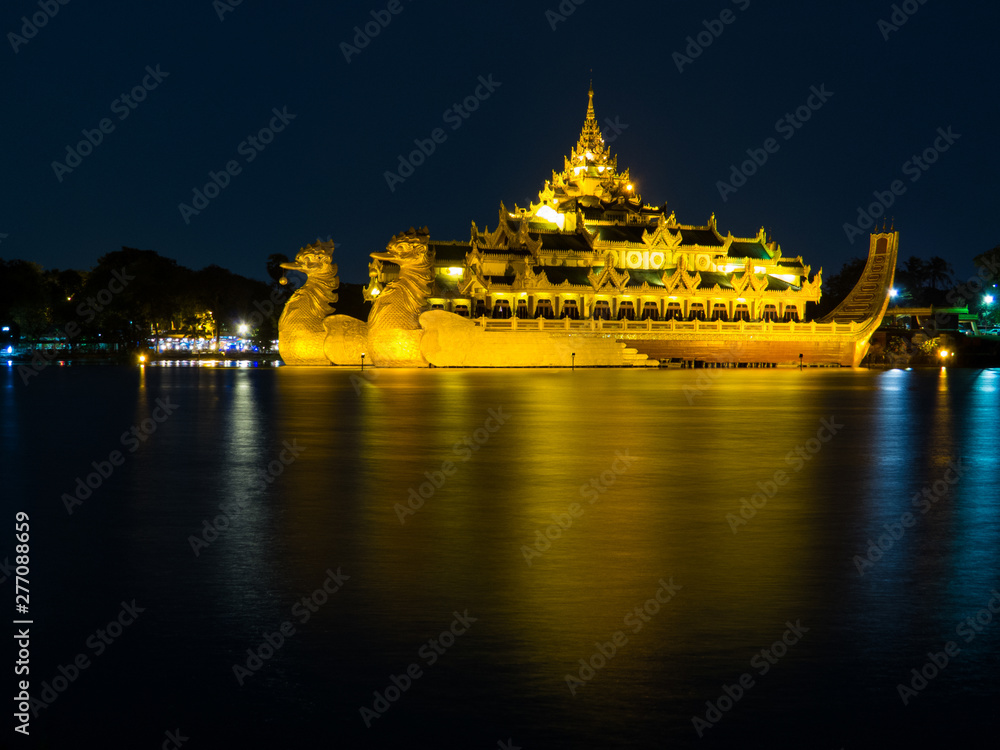 Karaweik Palace by night. In Yangon, Myanmar