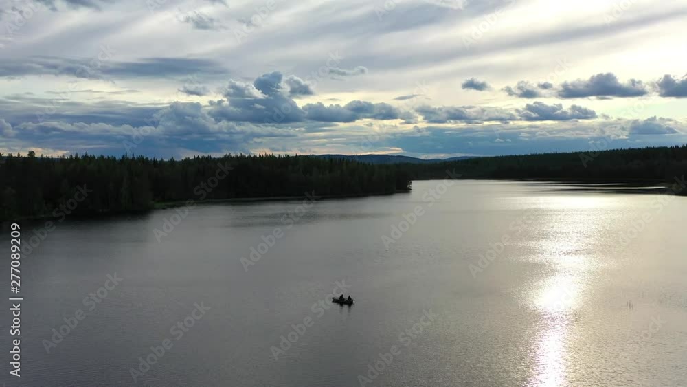 Perfect view of a Boat with people Enjoying their Vacation time in the Summer, Drone Video taken in the middle of a Fresh Water Lake. Perfect view of a Boat with people Enjoying their Vacation time in the Summer, Drone Video taken in the middle of a Fresh Water Lake.