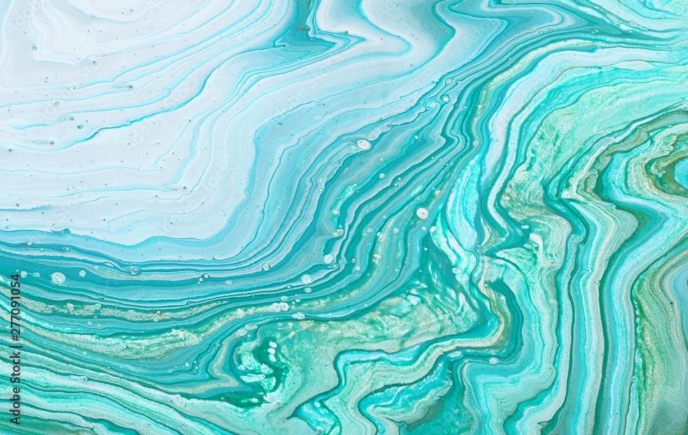 photography of abstract marbleized effect background. Blue, mint, gold and white creative colors. Beautiful paint photography of abstract marbleized effect background. Blue, mint, gold and white creative colors. Beautiful paint