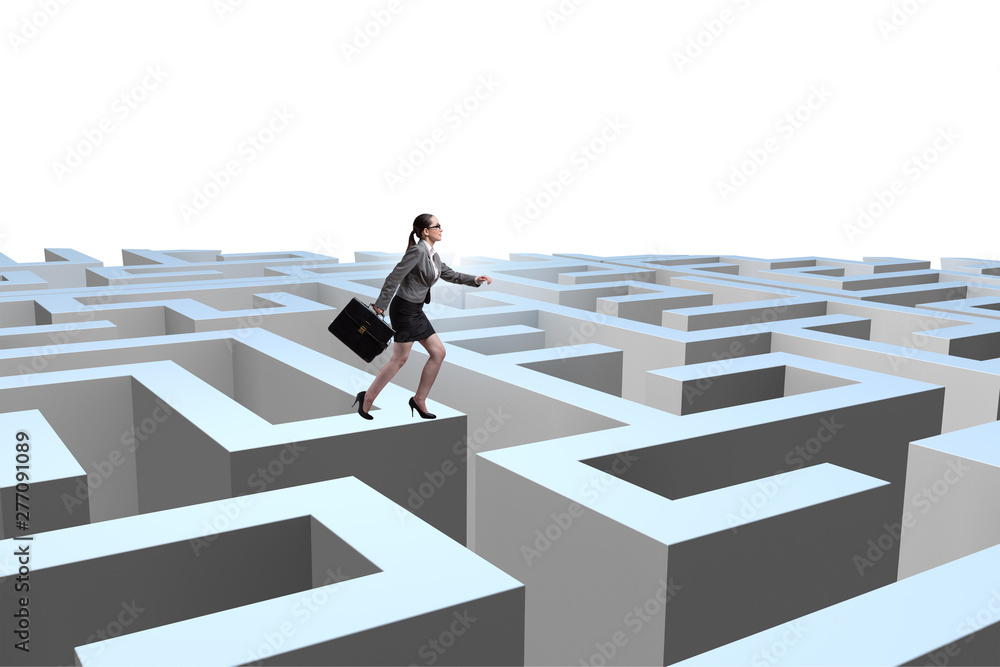 Businesswoman trying to escape from maze Businesswoman trying to escape from maze