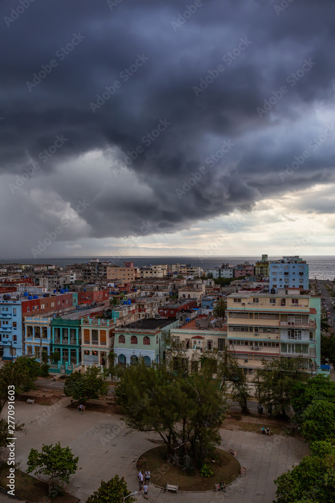 Aerial view of the Havana City, Capital of Cuba, during a dramatic and storm cloudy day.