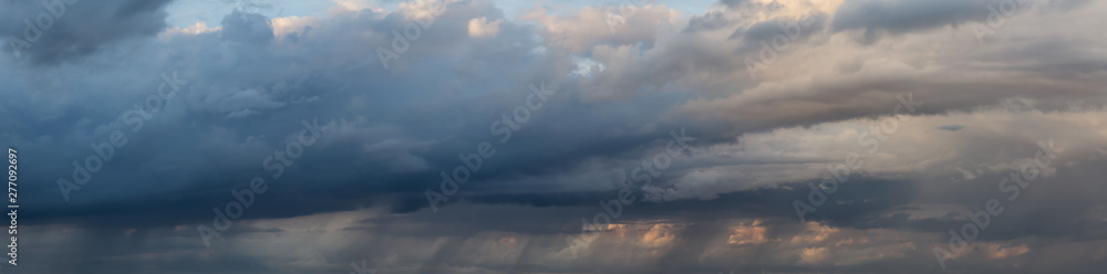 Dramatic Panoramic View of a cloudscape during a dark, rainy and colorful morning sunrise. Taken over Beach Ancon in Trinidad, Cuba. Dramatic Panoramic View of a cloudscape during a dark, rainy and colorful morning sunrise. Taken over Beach Ancon in Trinidad, Cuba.