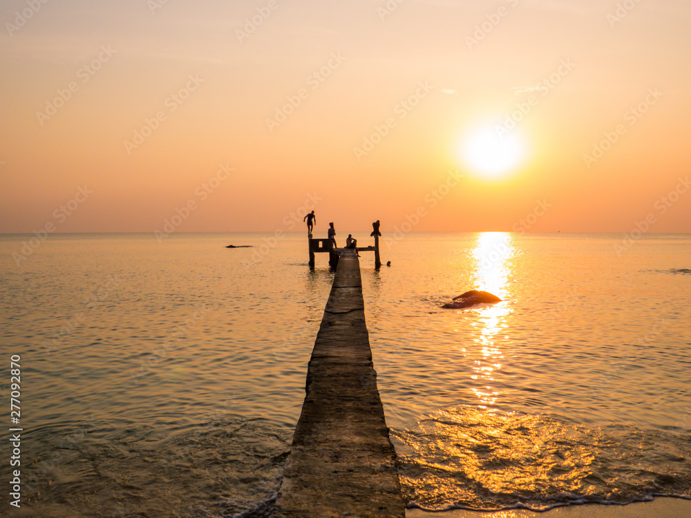 People on the pier at sunset. In Phu Quoc island, Vietnam